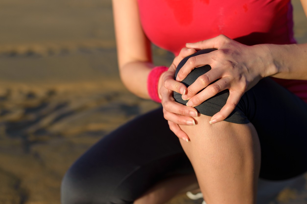 Woman sore knee