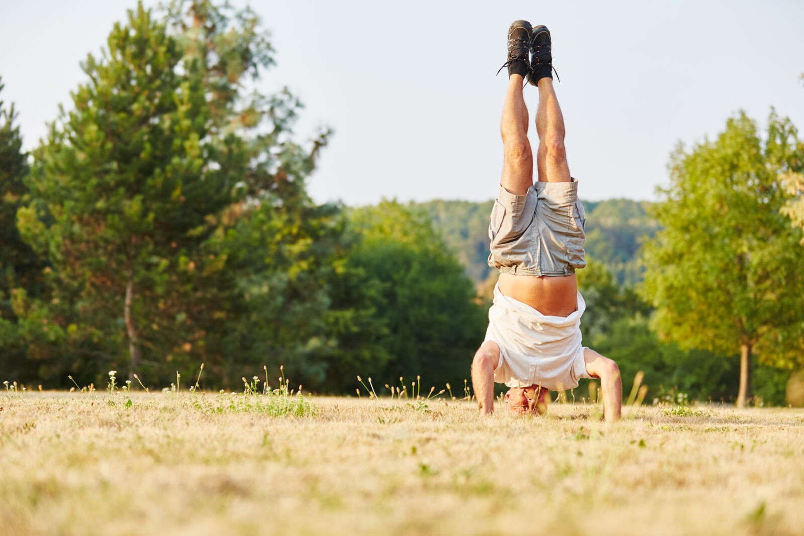Old man hand stand