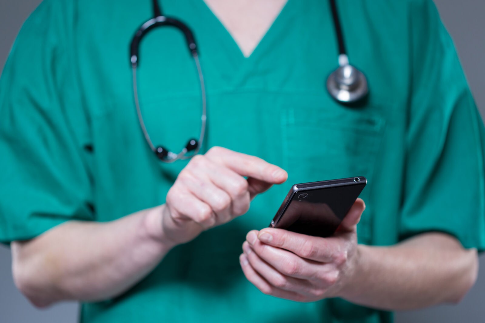 Doctor using phone