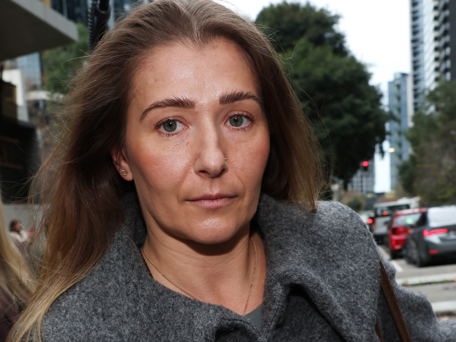 Emily Lal leaves the inquest into the death of Stacey Warnecke at the Melbourne Coroners Court. Photo: AAP.