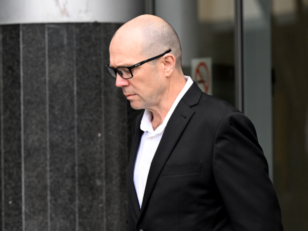 Dr Richard William Laherty leaves Brisbane Magistrates Court on 15 January 2026. Photo: AAP.