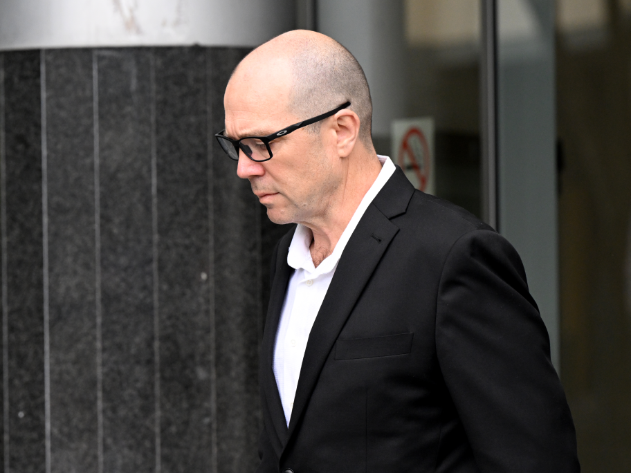 Dr Richard William Laherty leaves Brisbane Magistrates Court on 15 January 2026. Photo: AAP.