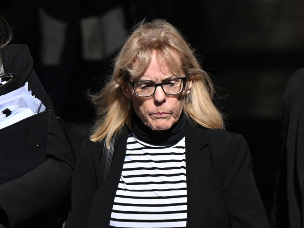 Dr Robyn Mary James arrives at the Brisbane Supreme Court on 4 August. Photo: AAP.